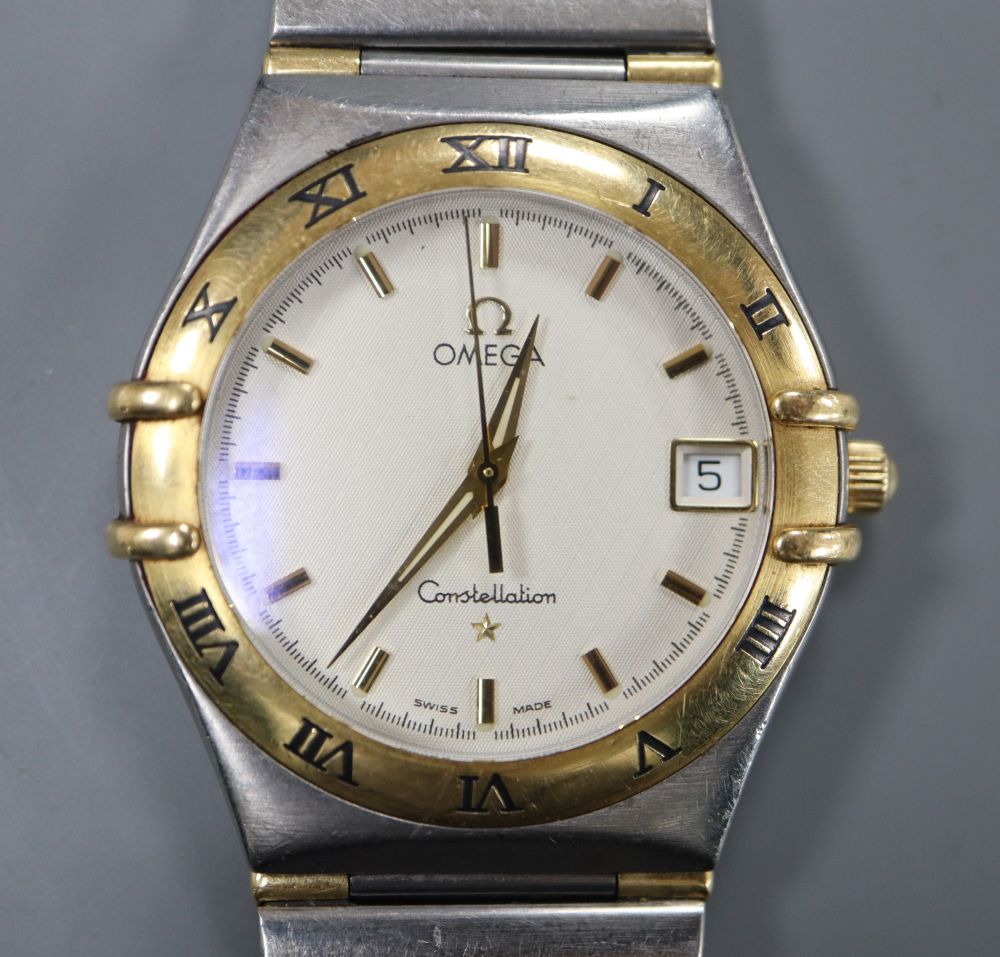 A gentlemans stainless steel and yellow metal Omega Constellation quartz wrist watch